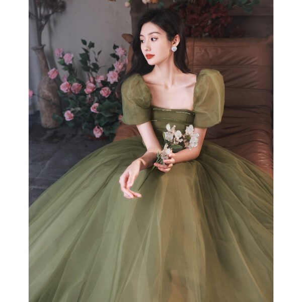⁦ملابس سهرة بتصميم جنية متقلبة باللون الأخضر⁩ - الصورة ⁦3⁩